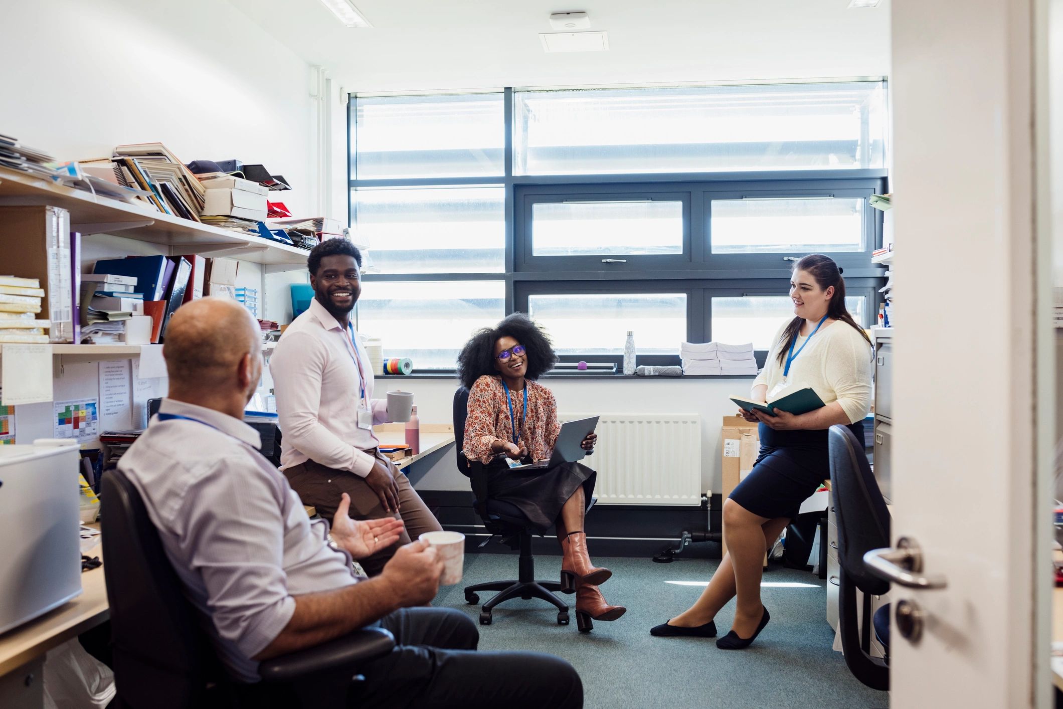 Team members together in an office setting